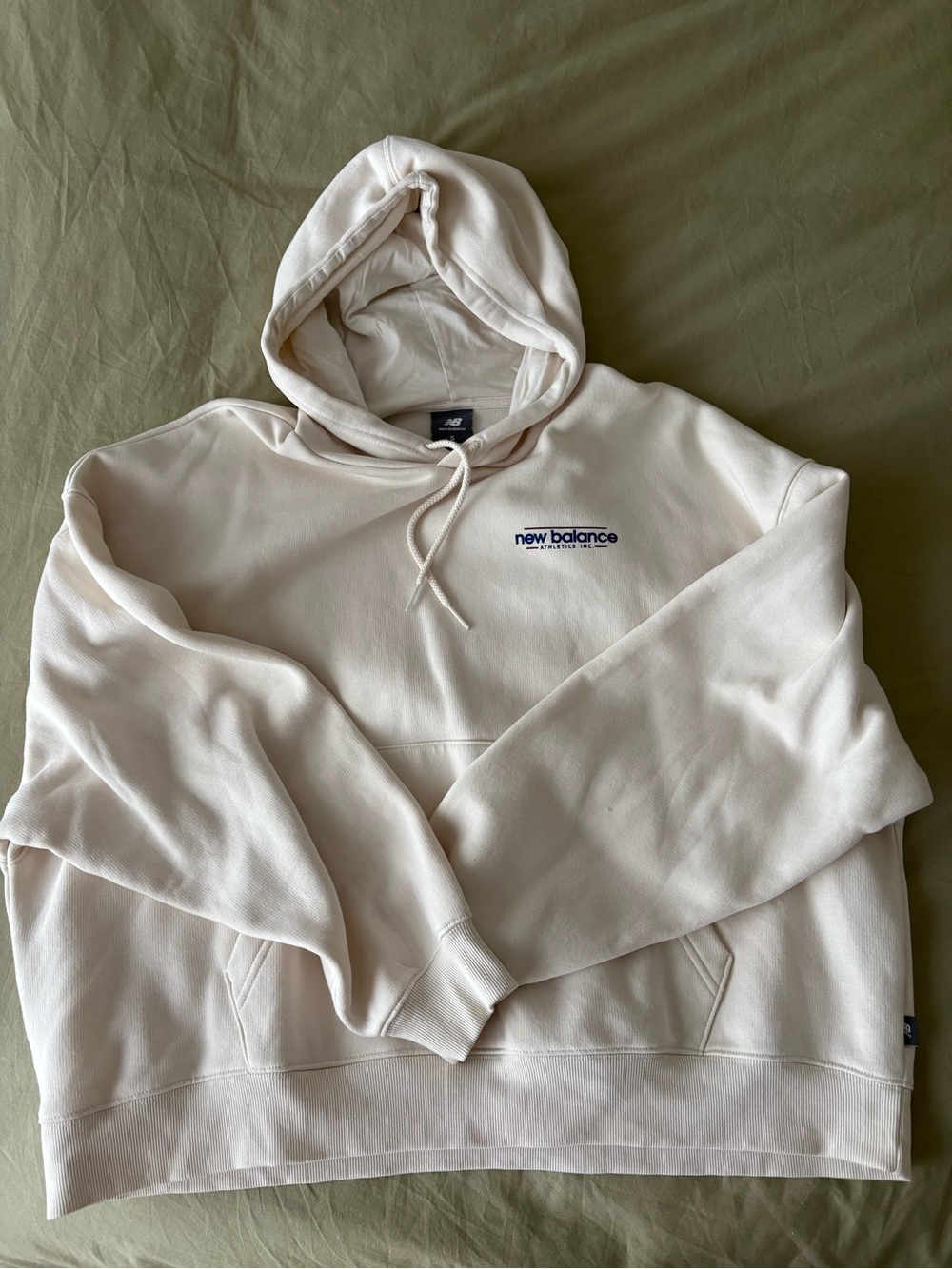 New Balance Women’s Off-White Pullover Hoodie with Navy Logo